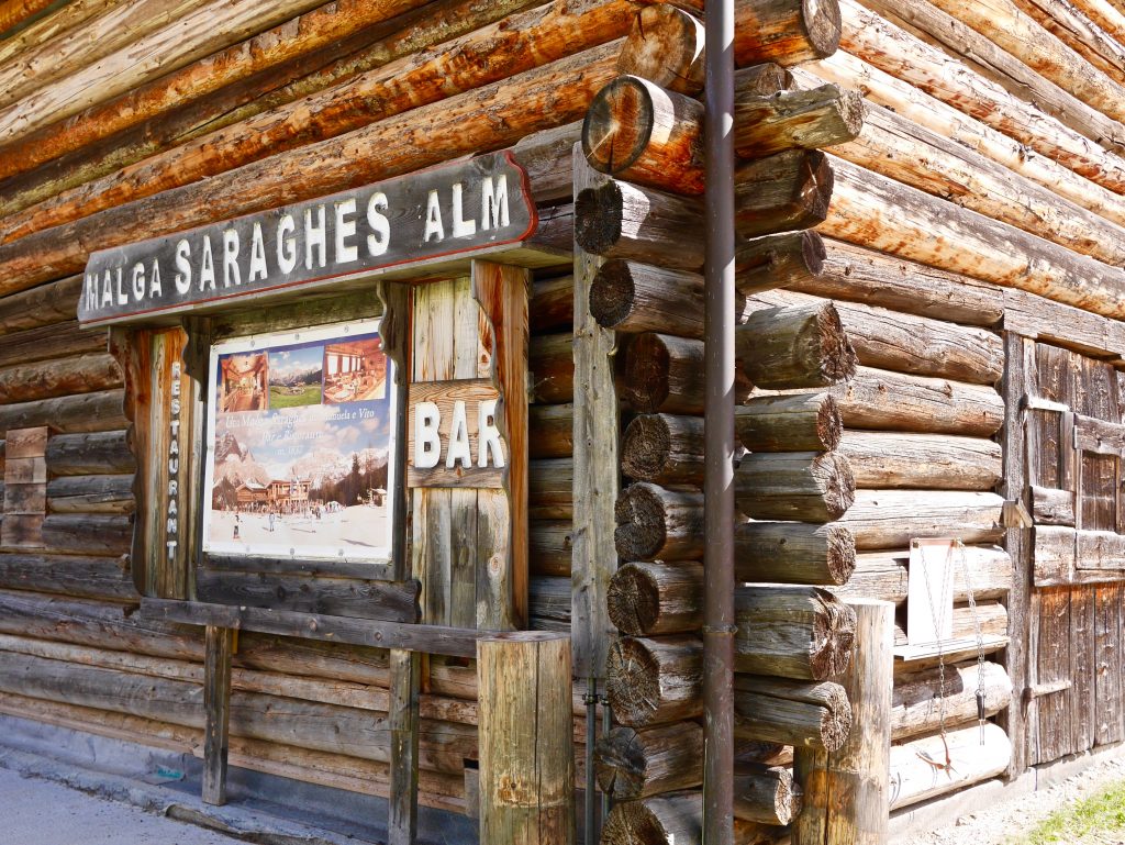 wooden hut at the bottom of the valley 'malga Saraghes all' bar and restaurant