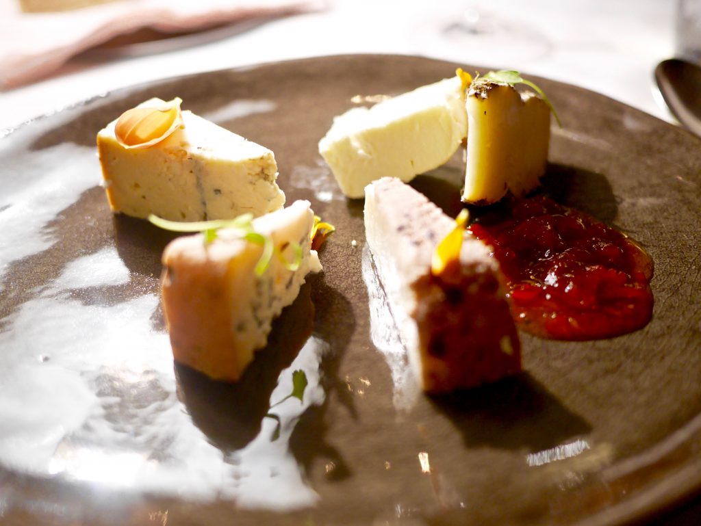 Italian cheese plate accompanied with honey