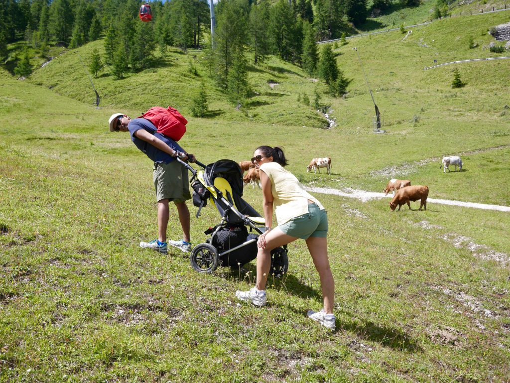 family tired having a break from pulling the pram up the mountains!
