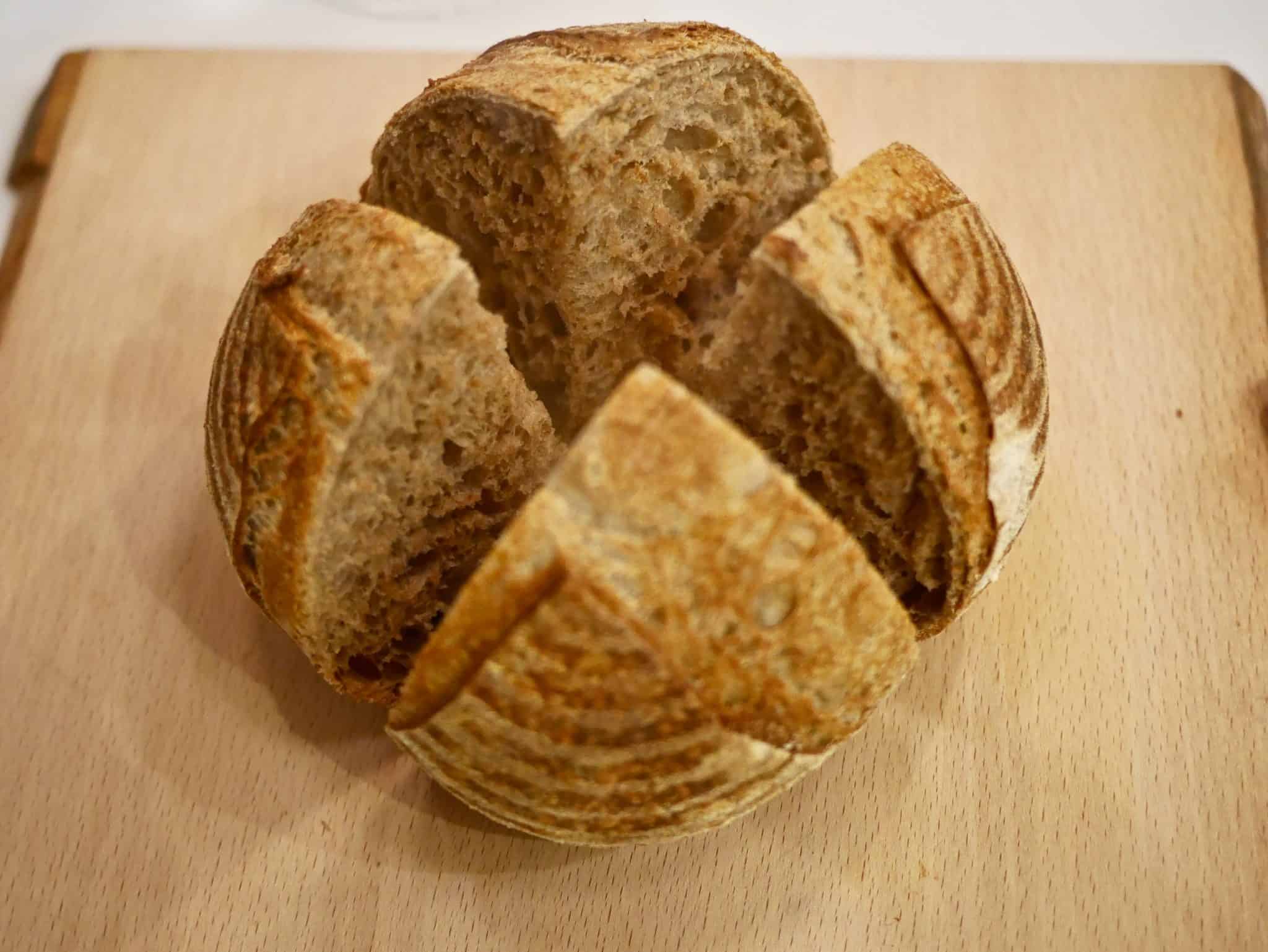 picture from above of hot loaf cut in quarters