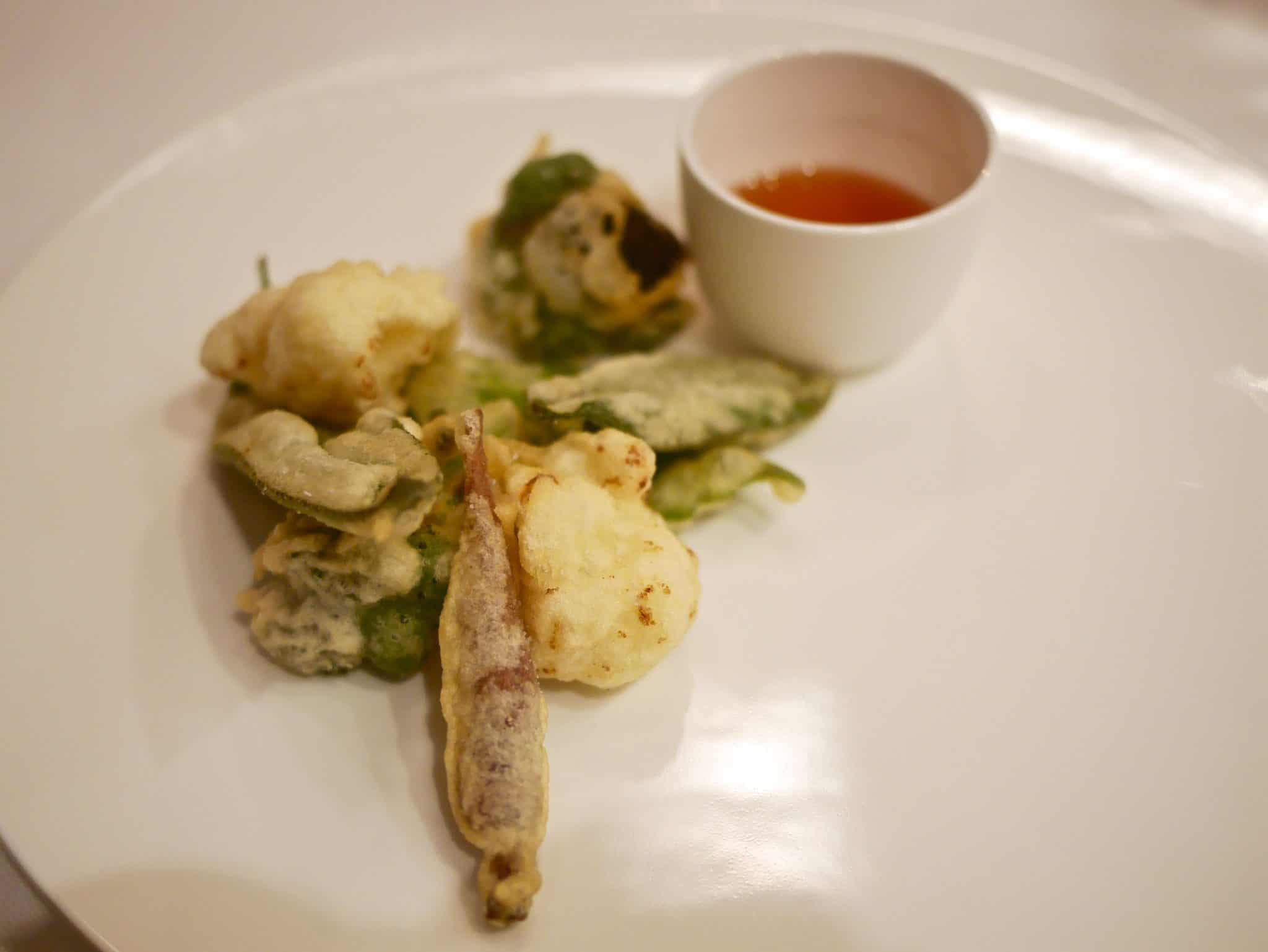 Vegetable tempura with a sweet sticky sauce.