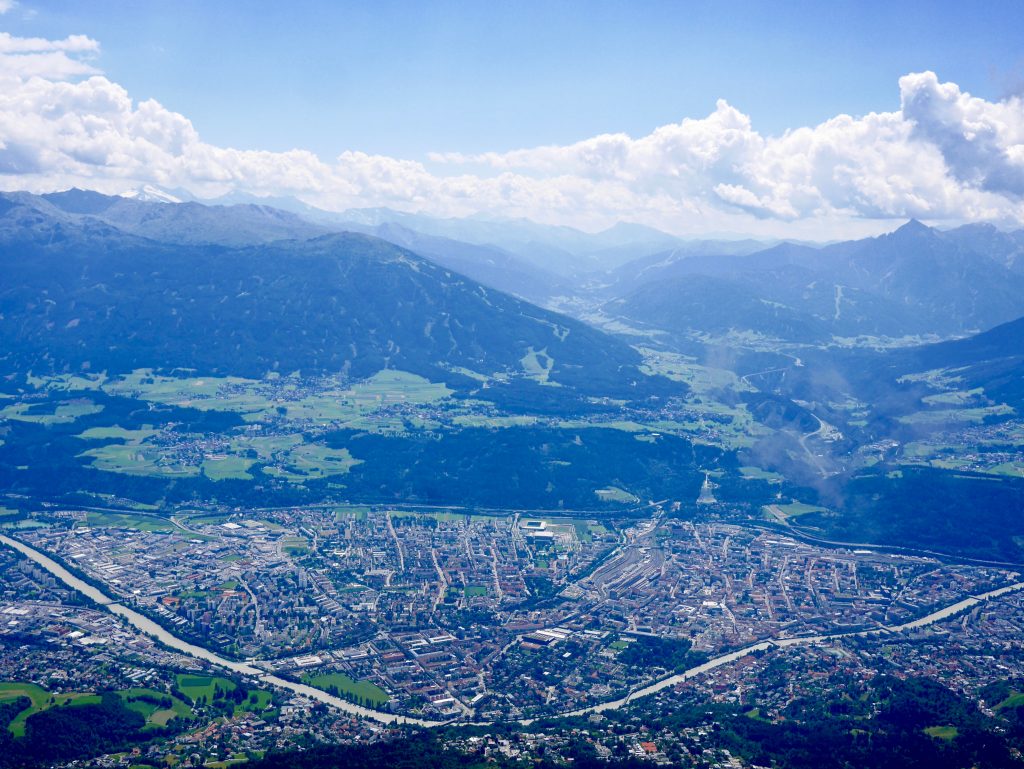 birds eye view of innsbruck from flight into the city