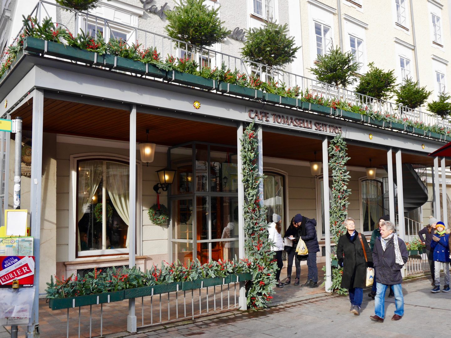 outside covered in foliage of Cafe Tomaselli