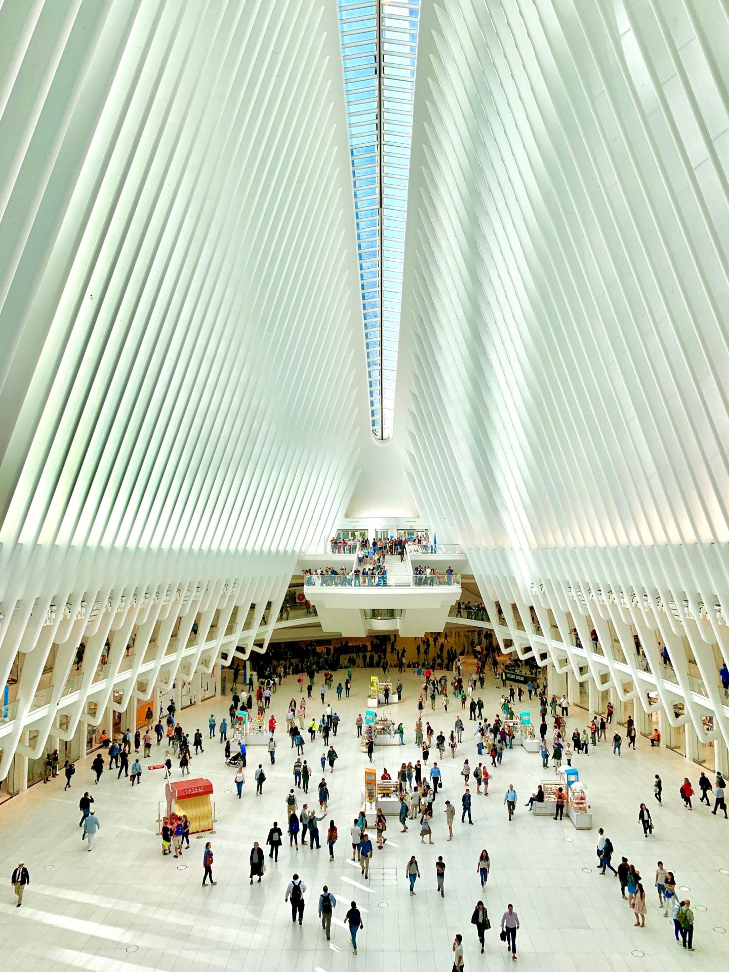 view of visitors in the all white 9/11 museum