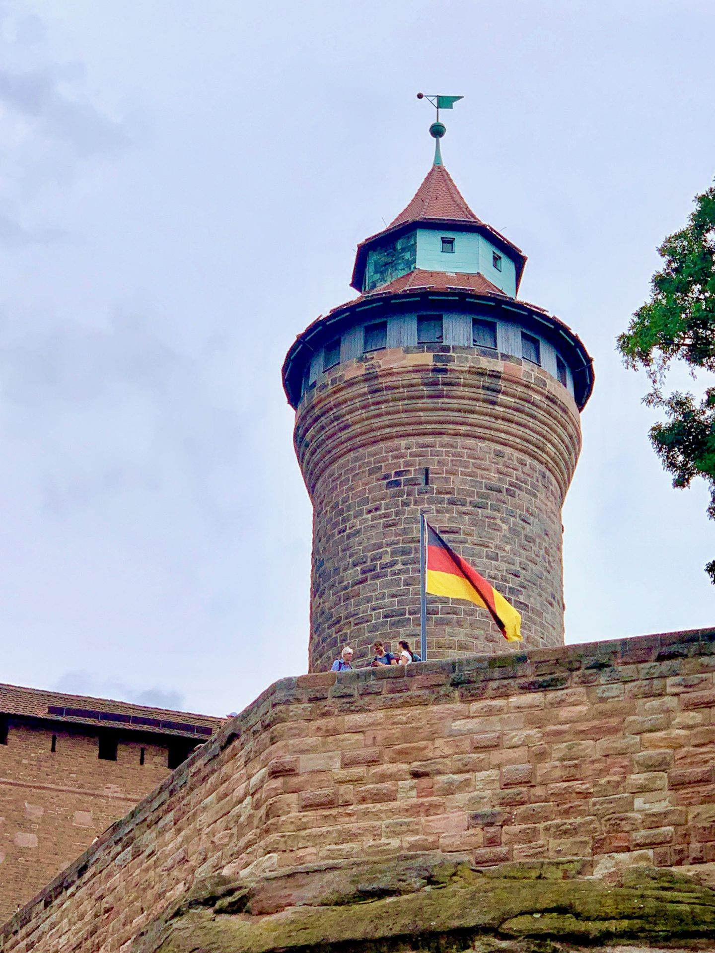 VIEW OF KAISERBERG (IMPERIAL CASTLE) WITH GERMAN FLAG