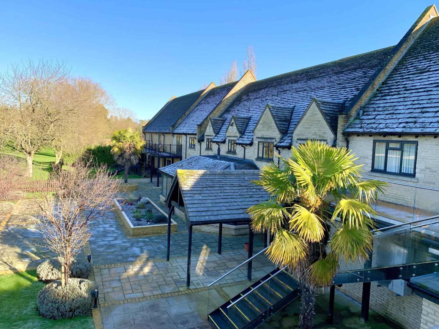 view of the outside of other rooms and the gardens of Bicester hotel golf and spa
