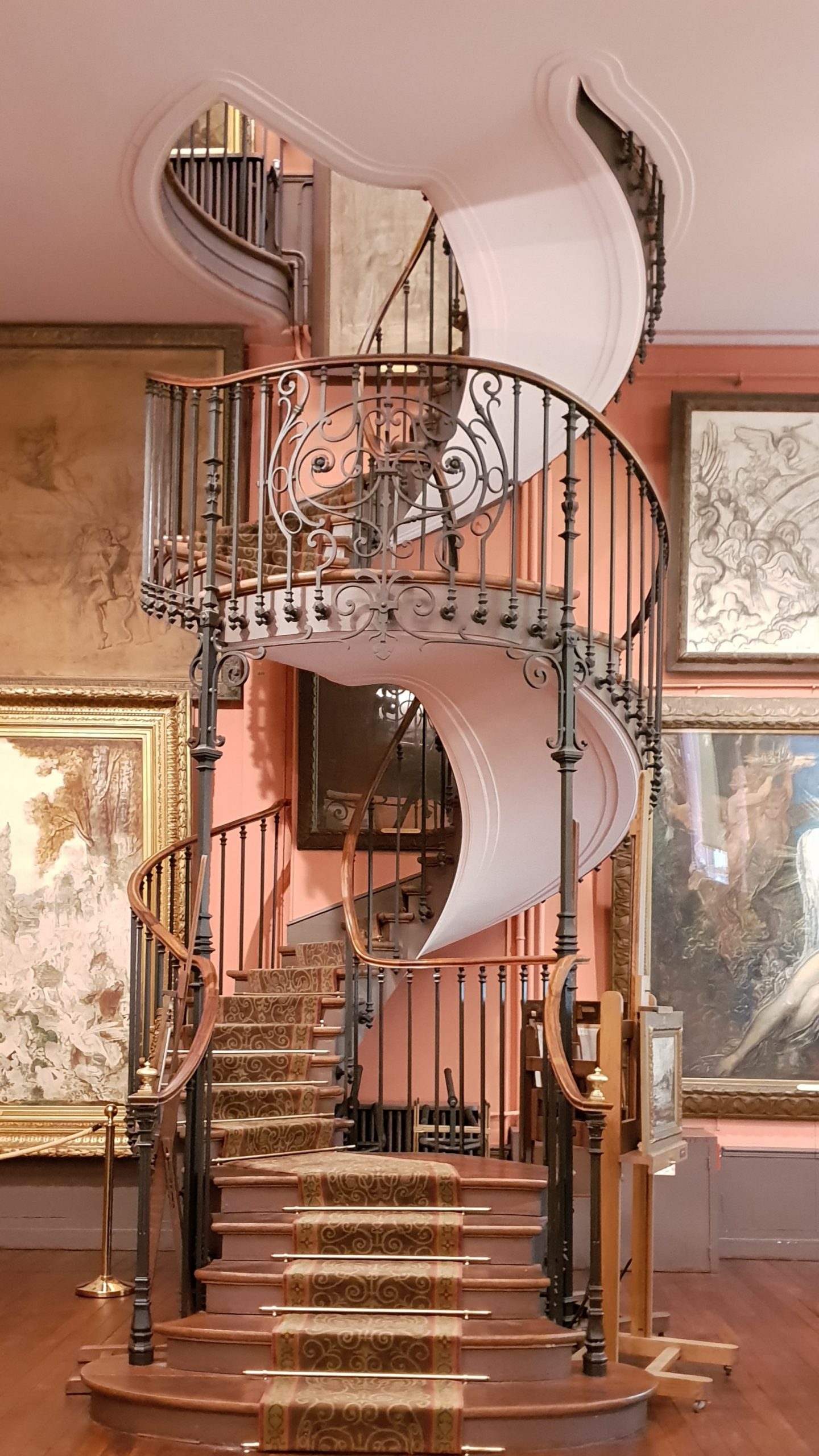 view of the windy wrought iron stairs in the Mussee Gustave Moreau