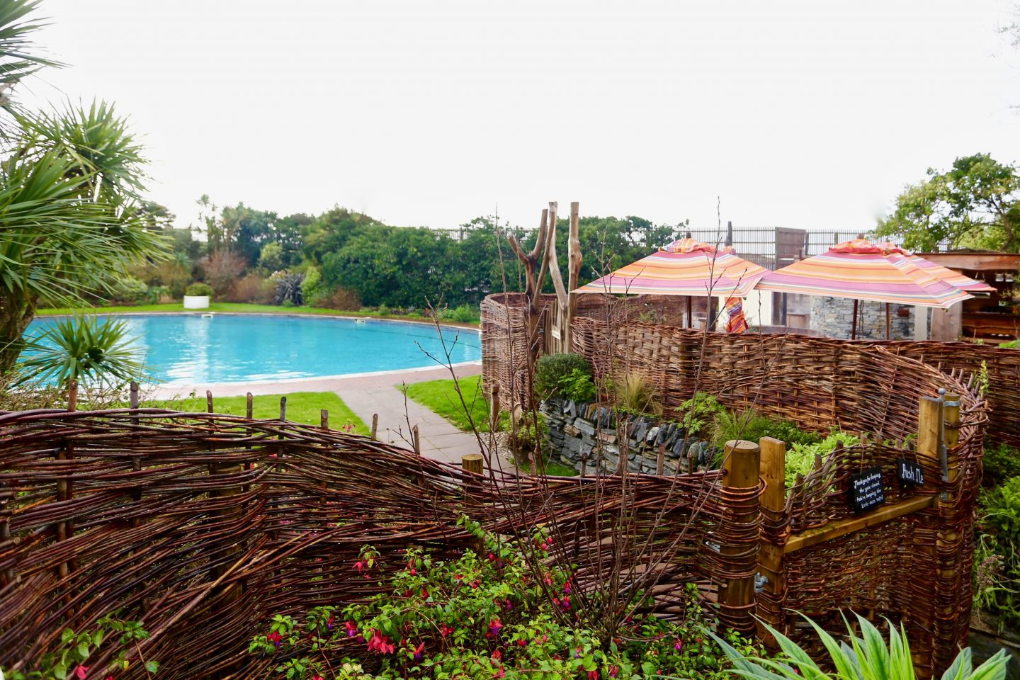 image looking over the swimming outdoor pool at Bedruthan hotel & spa