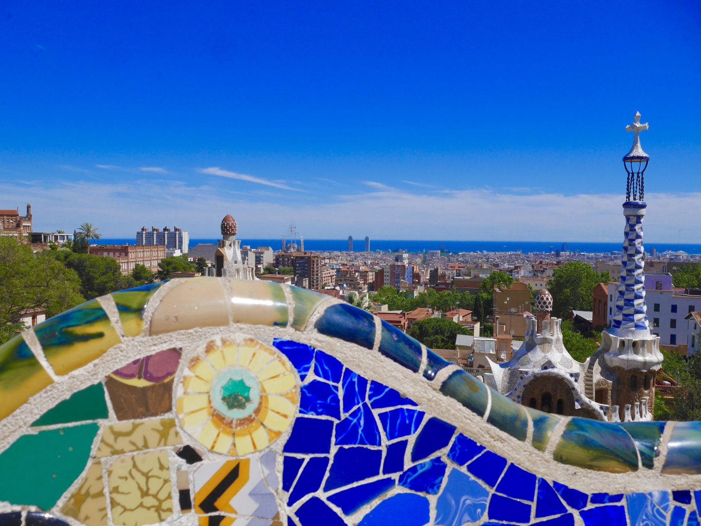 view of Barcelona, bright coloured and blue tiles looking down on the city