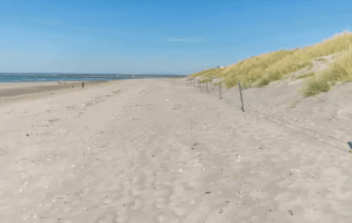 view looking down the deserted dessert looking west wittering beach