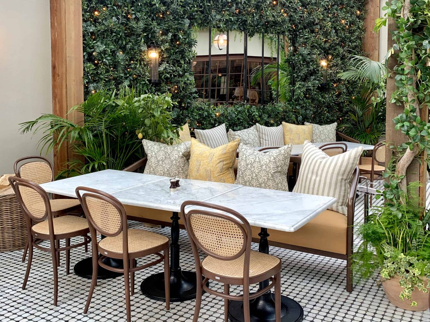 view of French chairs and mosaic floor in the Birnmam Brasserie
