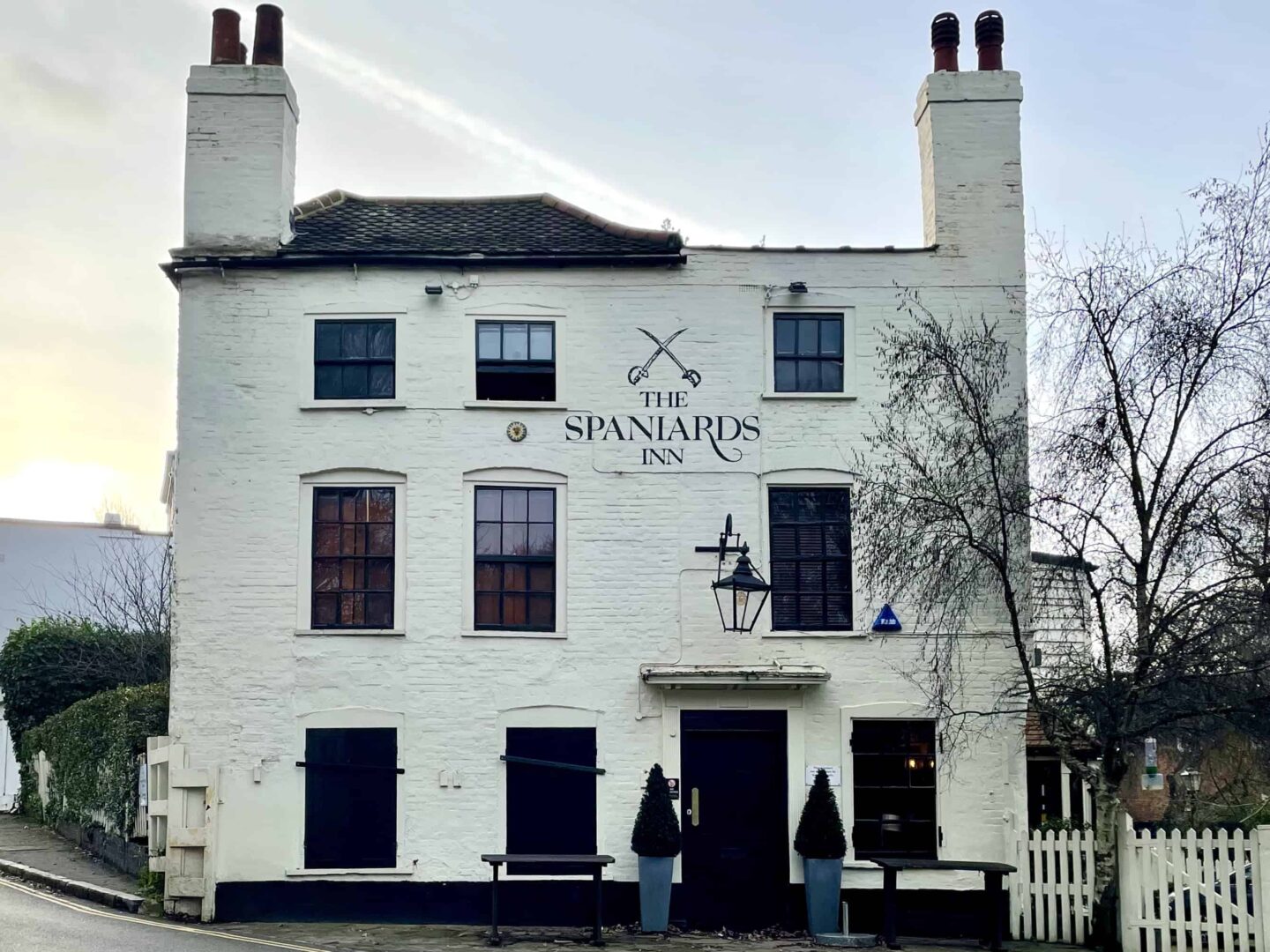 view of the white painted and black sash windows of the spaniards inn