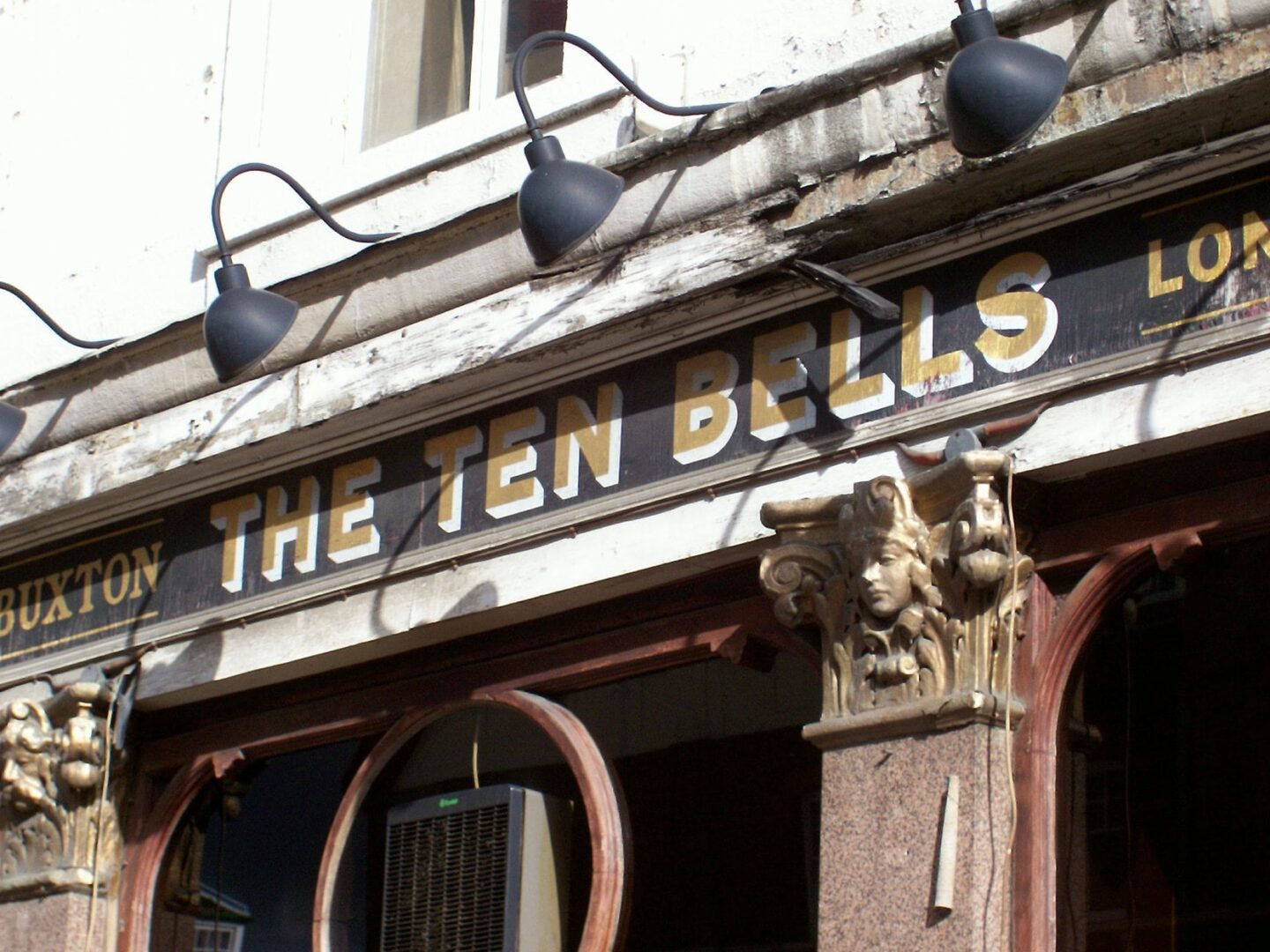 view of the sign above the pub of the ten bells
