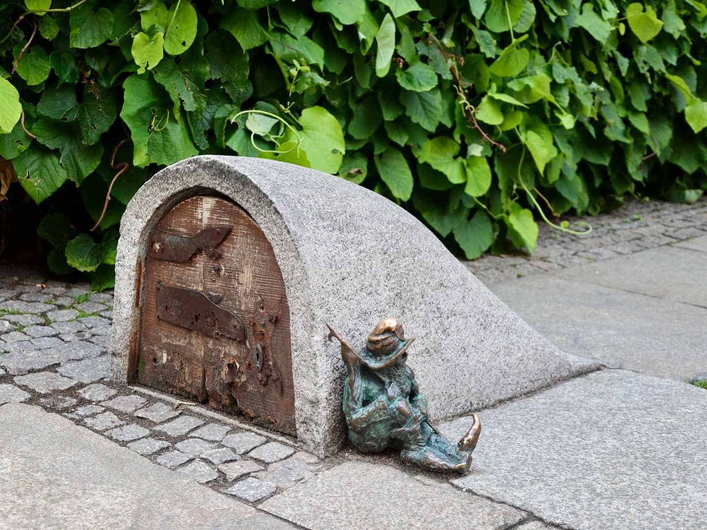 Sitting dwarf statue in Wroclaw